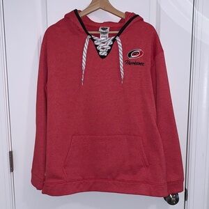 EUC Carolina Hurricanes lace front hoodie with kangaroo pocket. Size L